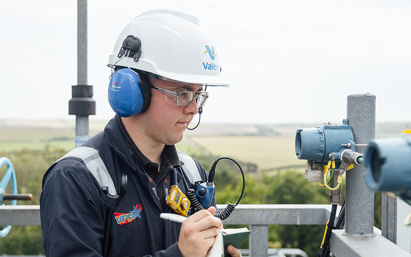 An engineer checking equipment at Valero’s Pembroke Refinery