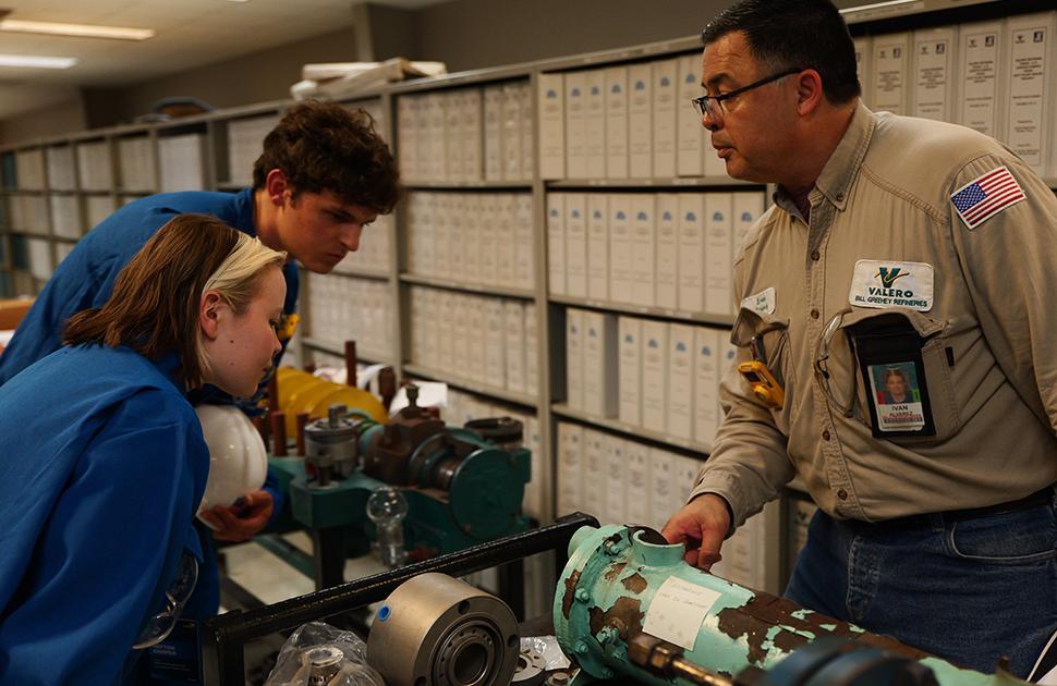 Students inspect refinery equipment at Valero's Freshman Engineering Summit.